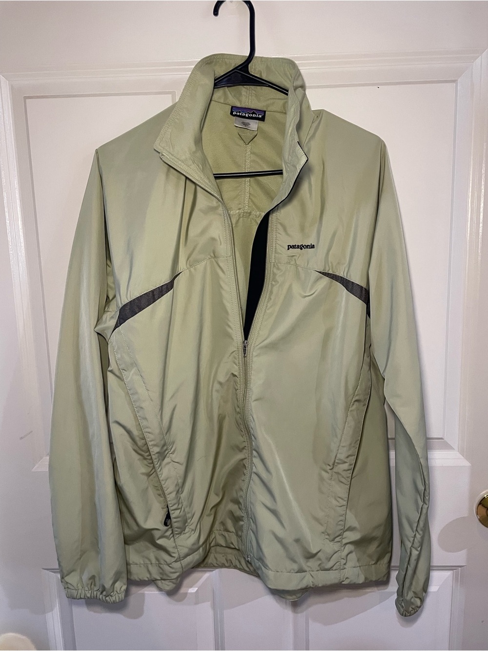 Patagonia Woman’s Pale Green Lightweight Full-Zip Rain Jacket